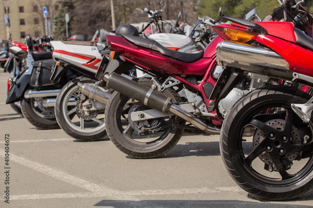 Motorcycles on parking in the city during the day