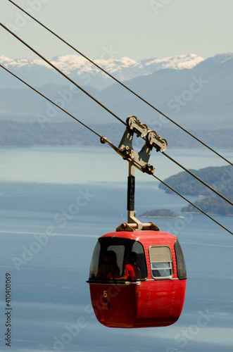 Bild auf Leinwand cable car with red cabins on