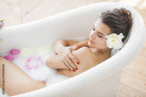 Perfect woman bathing. Female making spa procedure.