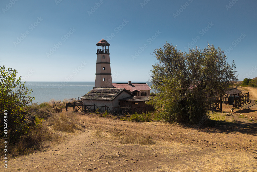 Lighthouse at the beach at the sea