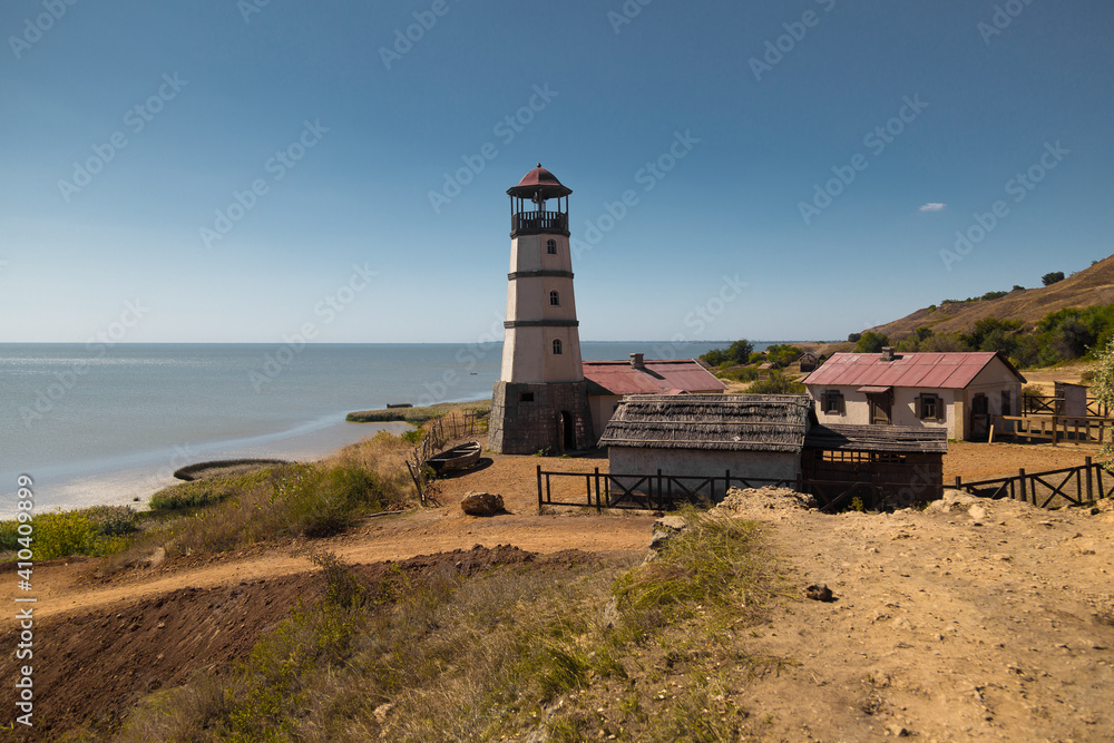 Lighthouse at the beach at the sea