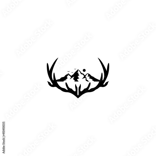 deer mountain logo with mountain on deer antlers. adventure community logo, outdoor apparel company logo, badge, sticker design