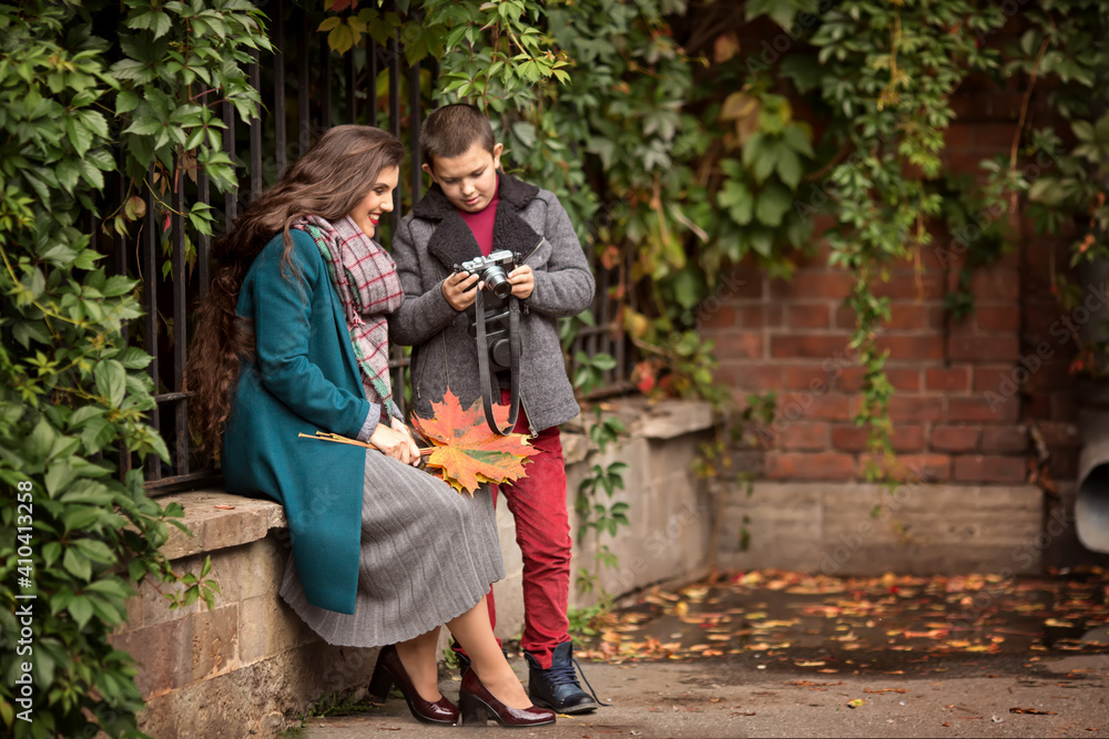 Fototapeta premium The trip of mother and son in the city of St. Petersburg. Photography and filming in the city. Vacation and Travel.