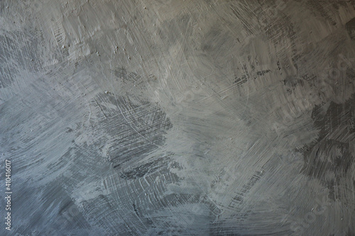Texture dipinta con effetto spatolato, tela di colore grigio in varie tonalità, spazio per test photo