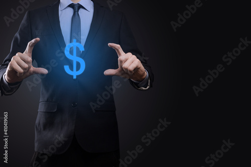 Successful international financial symbol sinvestment concept with businessman man person hold showing growth, charts and dollar sign, digital technology