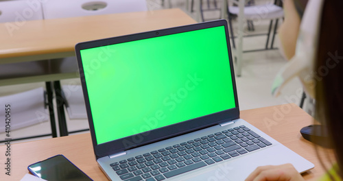 woman use green screen laptop