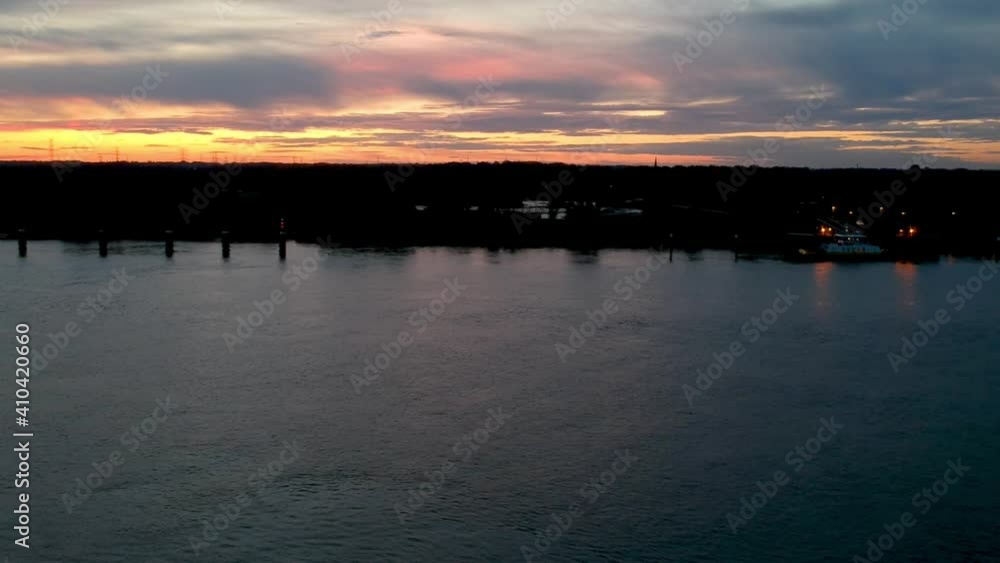 Harbor silhouette during golden hour in aerial drone shot Harbor silhouette during golden hour in aerial drone shot