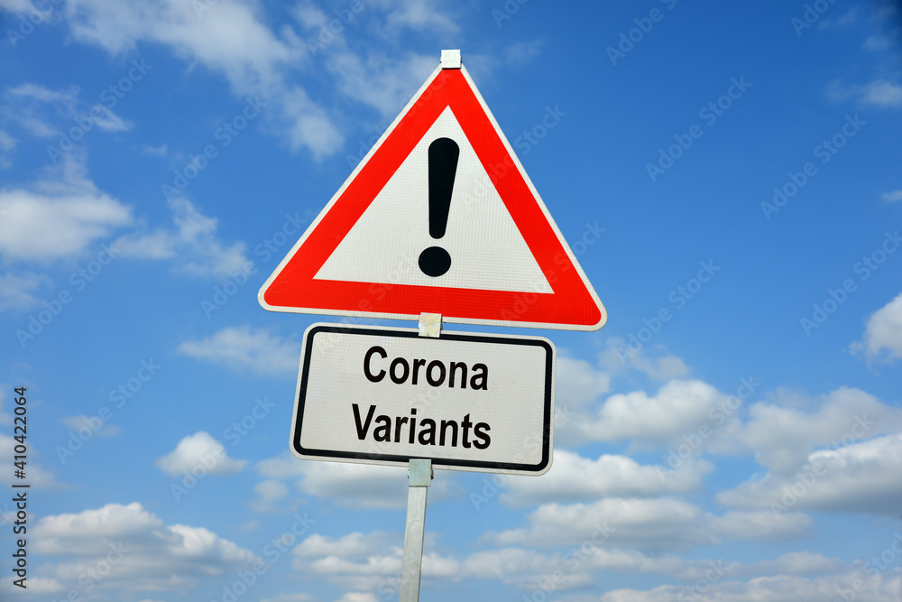 Hamburg, Germany - February 3, 2021: German Traffic warning sign with the note Corona Mutanten - symbolizes the danger from a worldwide epidemic Hamburg, Germany - February 3, 2021: German Traffic warning sign with the note Corona Mutanten - symbolizes the danger from a worldwide epidemic