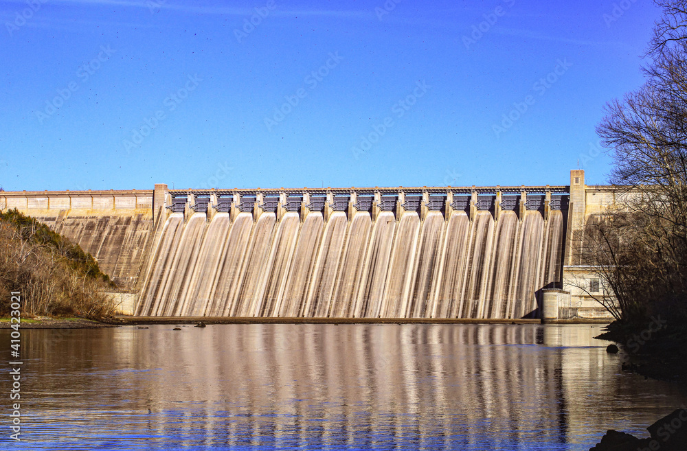 Shot of the Bull Shoals Dam dnd White River at minimum flow on a beautiful day in Bull Shoals, Arkansas 