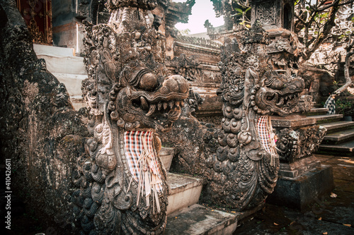 Traditional Balinese sculpture at the entrance of a Hindu religious temple. Also called Demons of the Bali temple.
