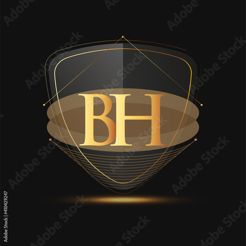 Initial logo letter BH with shield Icon golden color isolated on dark background, logotype design for company identity.
