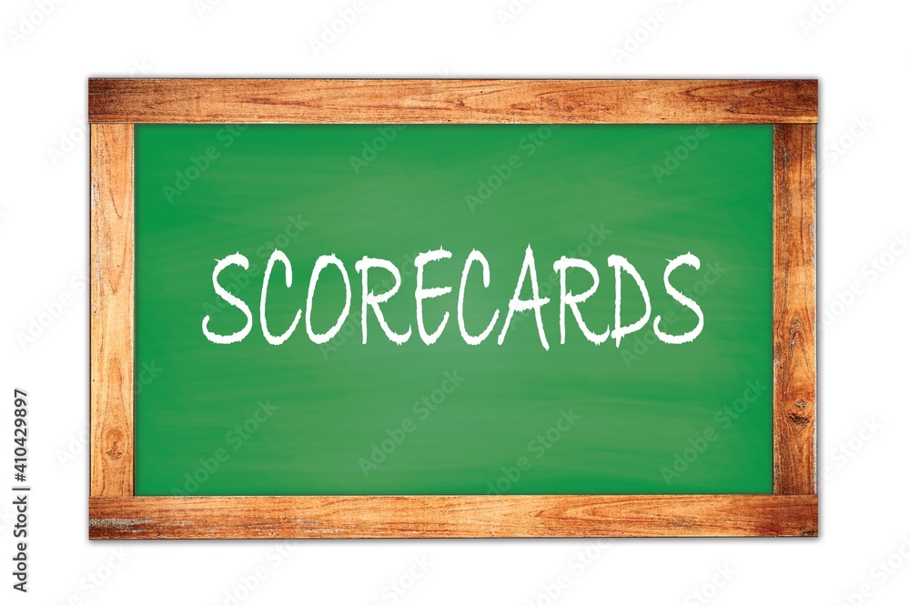 SCORECARDS text written on green school board. SCORECARDS text written on green school board.