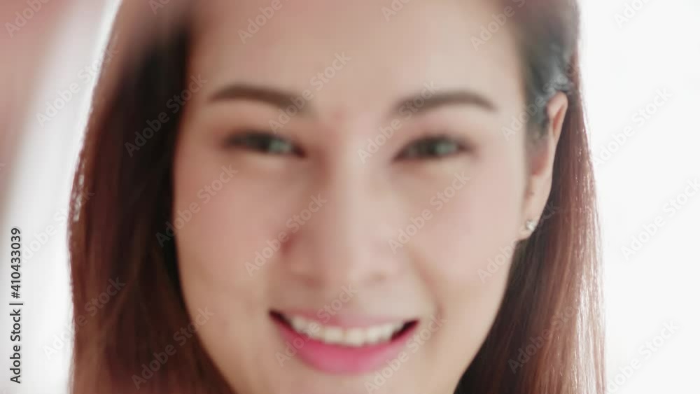 Lovely beautiful Asian woman smiling in the hand heart shape and very happy Lovely beautiful Asian woman smiling in the hand heart shape and very happy