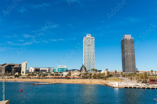 Canvas Print BARCELONA, SPAIN, FEBRUARY 3, 2021: Famous towers of the port of Barcelona, the Mapfre Tower and the Hotel Arts