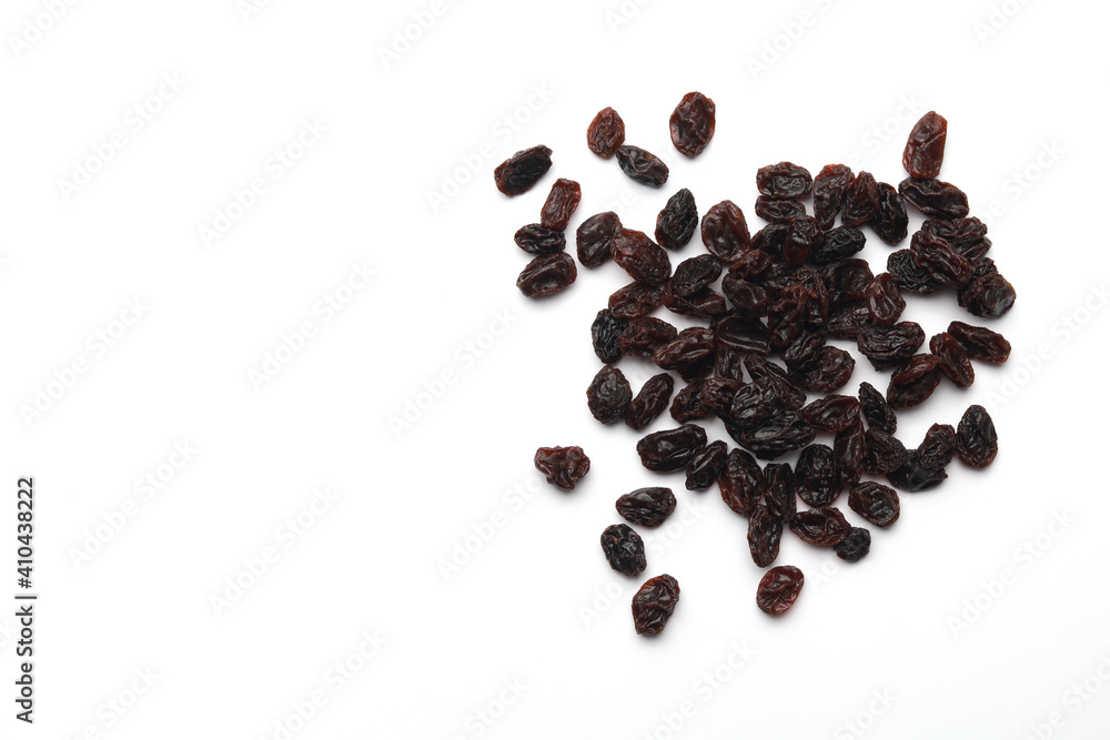 Raisins isolated on white background. Raisins are a type of grape that has been dried for around three weeks. Raisins isolated on white background. Raisins are a type of grape that has been dried for around three weeks.