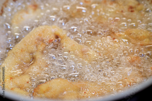 Fish fillet frying in boiled oil