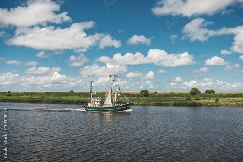 Shrimp boats in the Leyhoerner-Sieltief bei Greetsiel photo