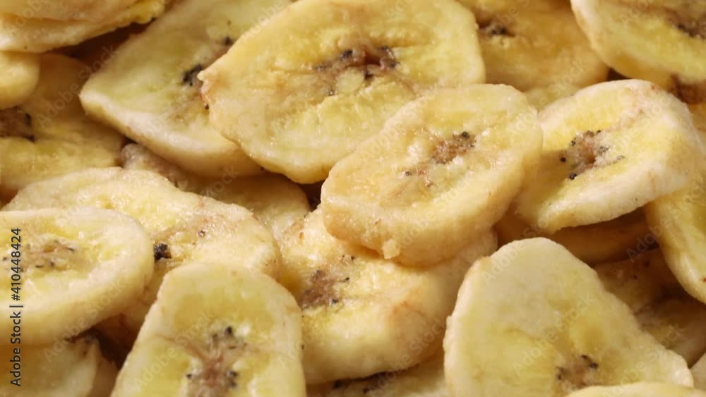 Dried sweet banana chips close up full frame Dried sweet banana chips close up full frame