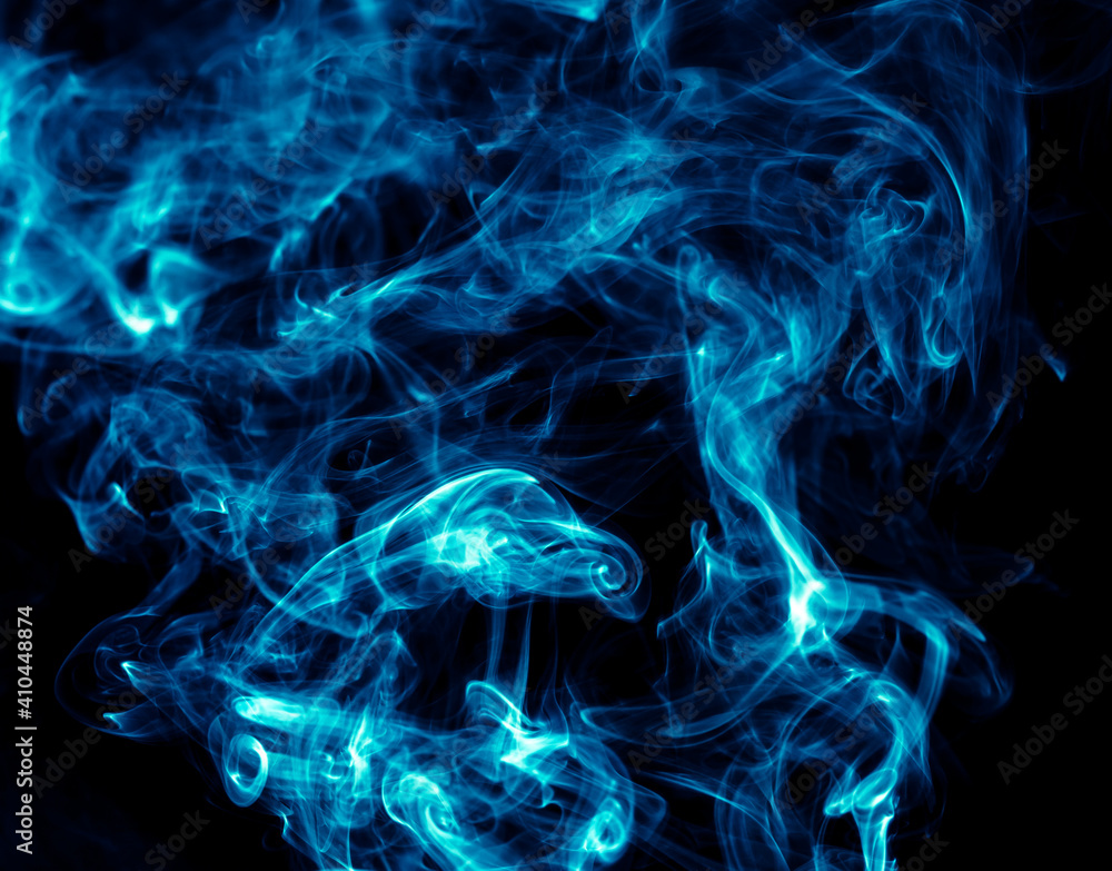 Obraz premium Blue smoke isolated on black background.