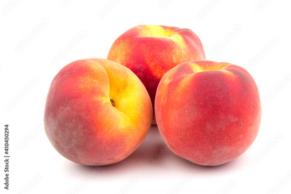 Summer fruit background. Ripe juicy peaches on white background. Copy space. Fresh organic fruit vegan food. Harvest concept Summer fruit background. Ripe juicy peaches on white background. Copy space. Fresh organic fruit vegan food. Harvest concept