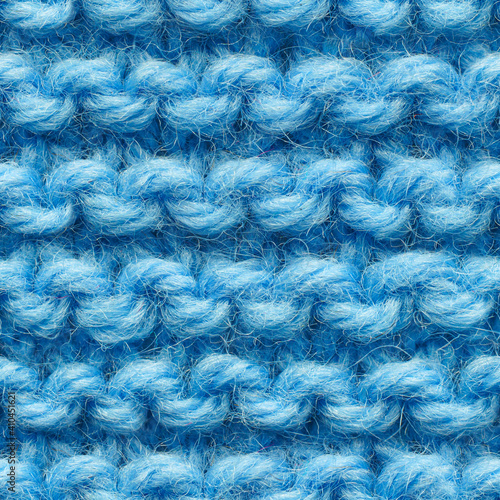 Blue knitted fabric seamless pattern for borderless fill. Knitted fabric repeating pattern for background close up.
