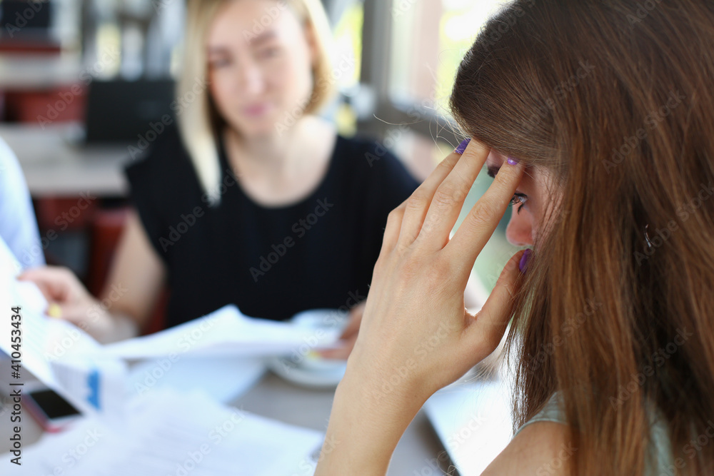 businessmen stady documents in cafe. discuss chart report businessmen stady documents in cafe. discuss chart report