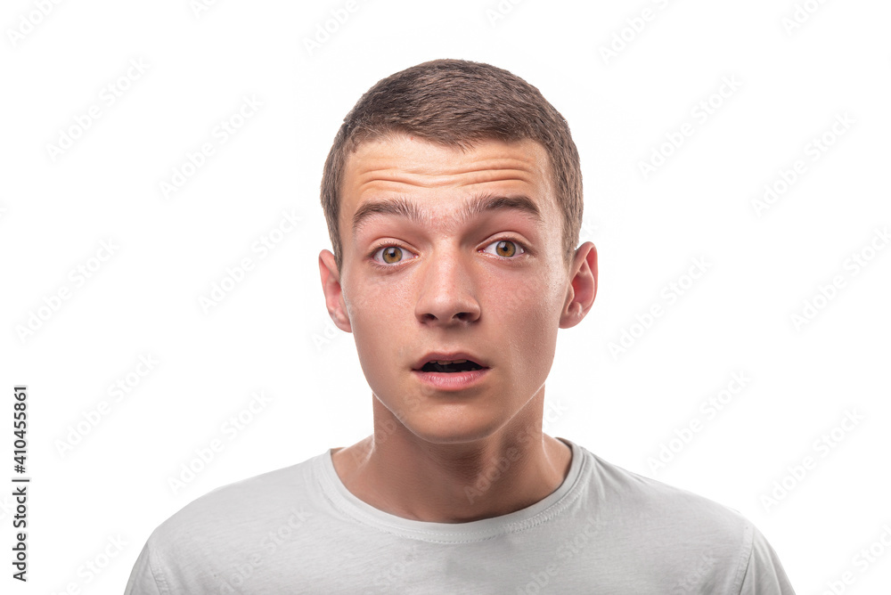 Funny young guy portrait isolated on white background. Funny young guy portrait isolated on white background.