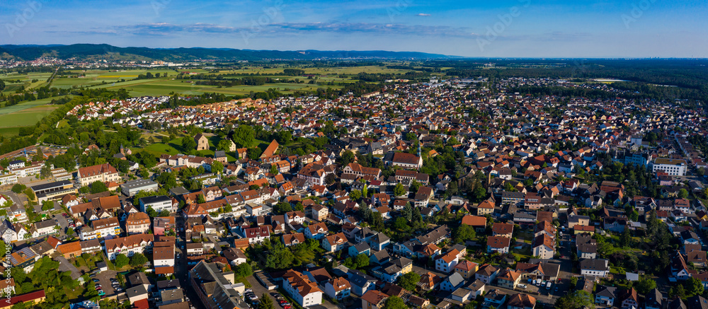 Aerial view of the city Lorsch and monastery in Germany on a sunny day in spring.	