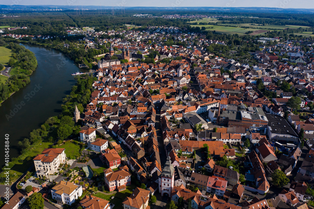 Aerial view of the old town of the city Seligenstadt in Germany on a sunny day in spring.	