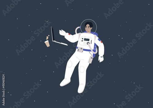 Young male Asian astronaut in a spacesuit working on their laptop in outer space, a futuristic life concept