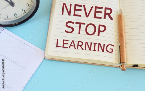 Never stop learning text written in Notebook. Learning concept.