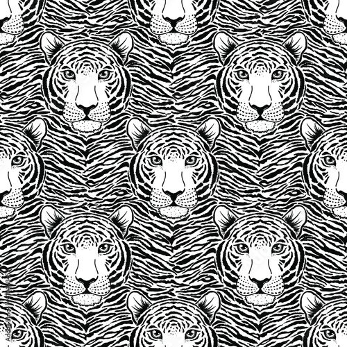 Seamless pattern with tiger muzzle on striped background.
