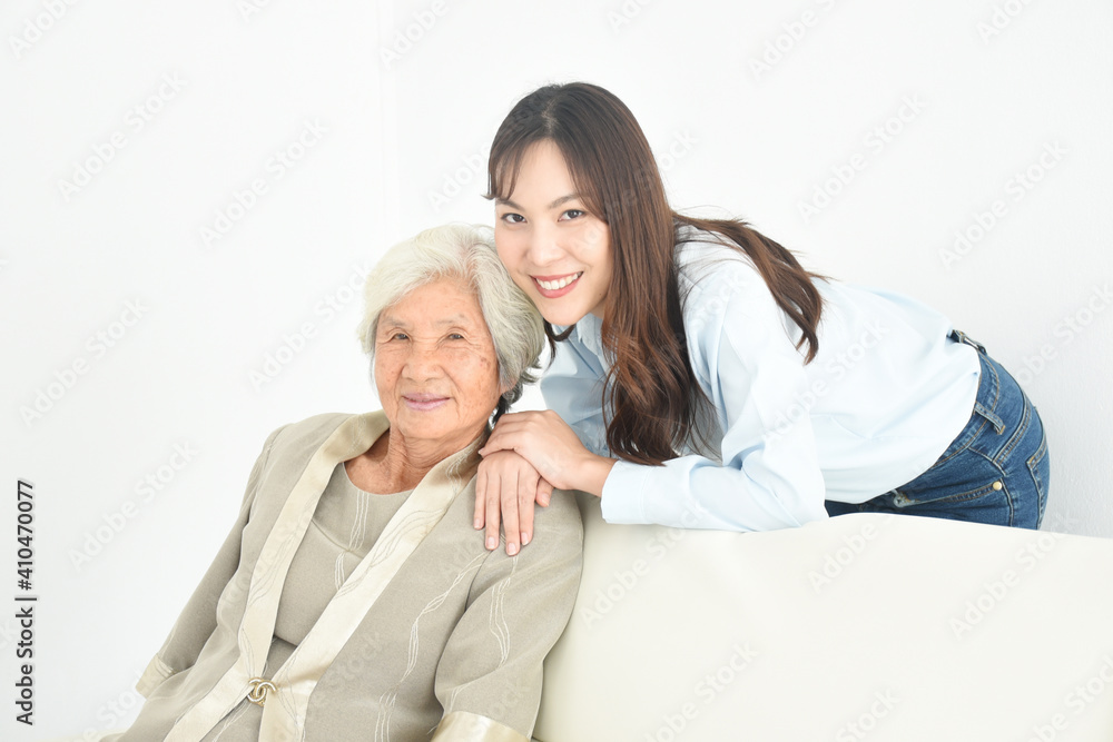 Fototapeta premium couple mother and daughter at their home