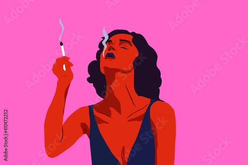 the girl smokes alone, after a hard day. Lonely girl smokes a cigarette. Thinks about his past and future.