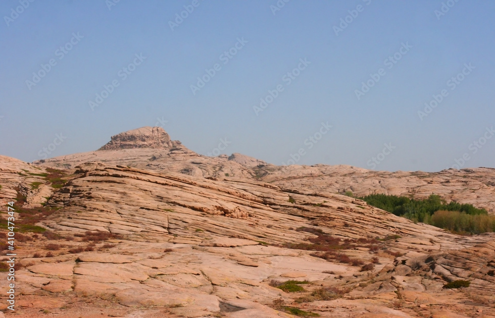 Bektau-Ata Tract. Bektau mountains. Rock formations in Bektau Ata in Kazakhstan in summer. Desert mountains Bektau-Ata. Focus on mountains