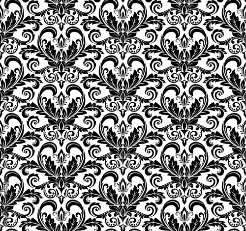 Wallpaper in the style of Baroque. Seamless vector background. White and black floral ornament. Graphic pattern for fabric, wallpaper, packaging. Ornate Damask flower ornament