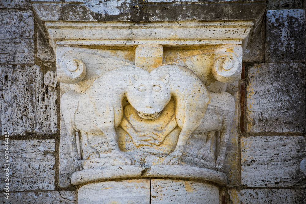 Capital of conjoined animals on the facade of Sant'Antimo's Abbey, Tuscany, Italy