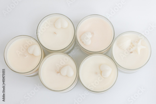 Many soy wax candles on the white background