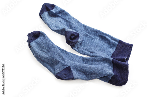 A pair of old men's sports socks isolated on a white background.