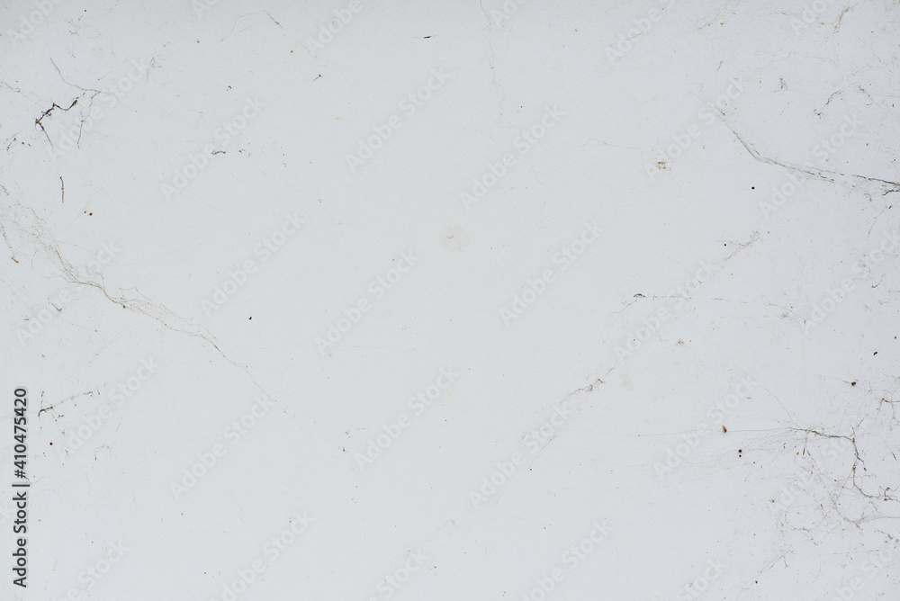 Aged white wall with cracks scratches and black brush strokes dirty old abandoned suburban texture Aged white wall with cracks scratches and black brush strokes dirty old abandoned suburban texture