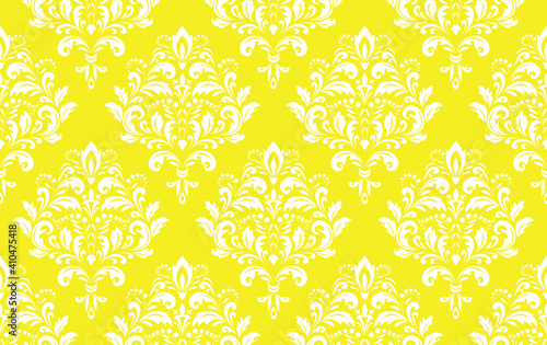Floral pattern. Vintage wallpaper in the Baroque style. Seamless vector background. White and yellow ornament for fabric, wallpaper, packaging. Ornate Damask flower ornament
