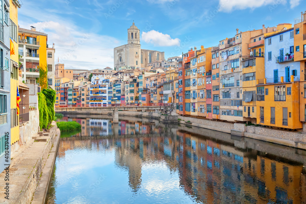 Girona, Spain. View of Cathedral and colorful houses  reflecting in Onyar river