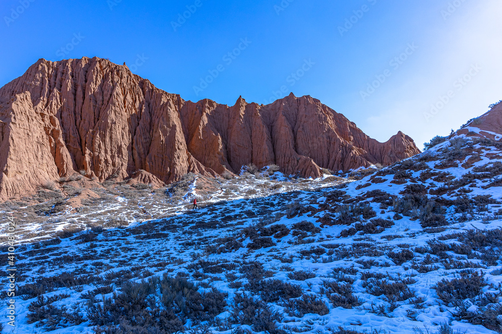 People in Mars canyon on south bank of Issyk kul lake Kyrgyzstan