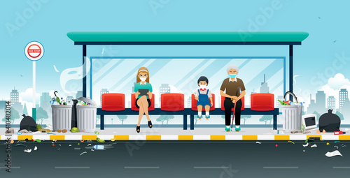 People wear masks to prevent odors from the garbage pile at the bus stop.