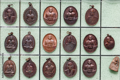 Phra Khuva Boonchum coins , Small Buddha image or Thai amulet