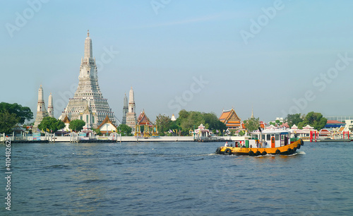 Impressive View of Wat Arun or the Temple of Dawn on the Chao Phraya River Bank, Thonburi District, Bangkok, Thailand