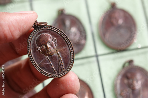 Phra Khuva Boonchum coins , Small Buddha image or Thai amulet