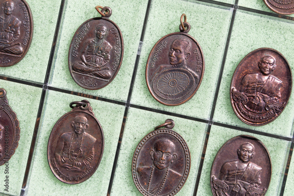 Phra Khuva Boonchum coins , Small Buddha image or Thai amulet