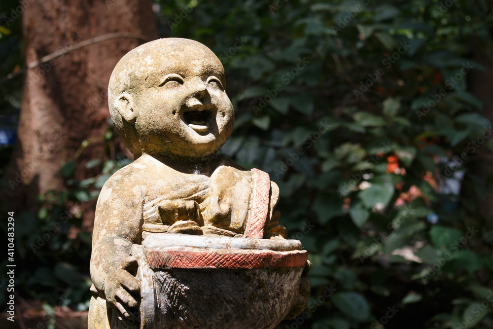 Statue of novices in Wat Umong Chiang Mai. Thailand