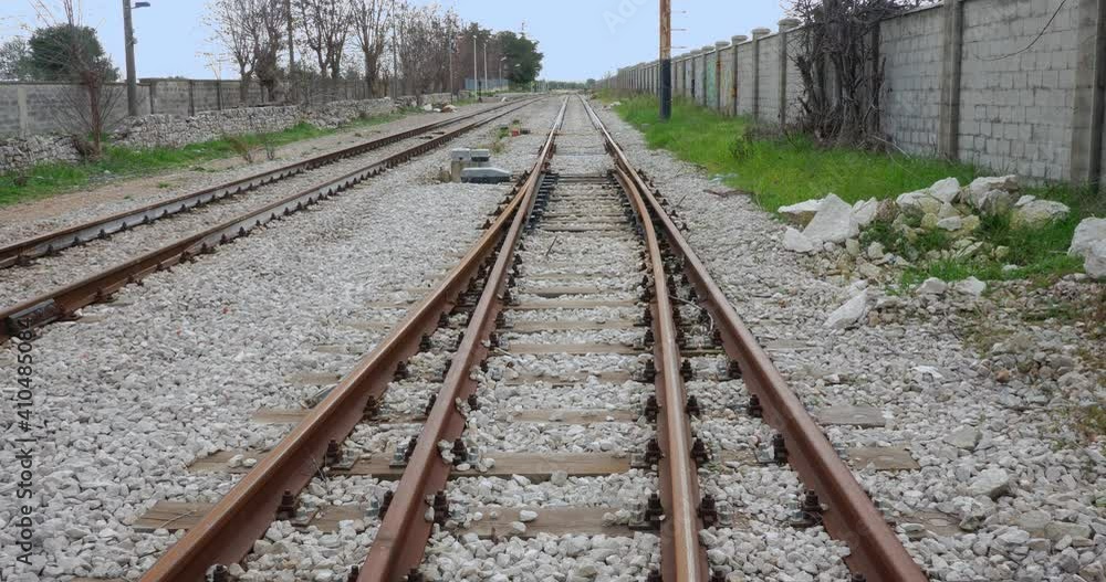 railway interchange and rails on the gravel bed of an abandoned railway line railway interchange and rails on the gravel bed of an abandoned railway line